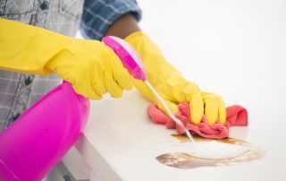 person cleaning up a stain